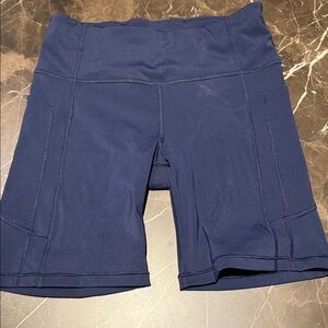 Athleta Salutation Stash workout shorts. 7” leg. Excellent condition.